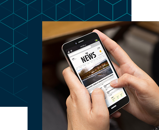 a mobile phone showing news